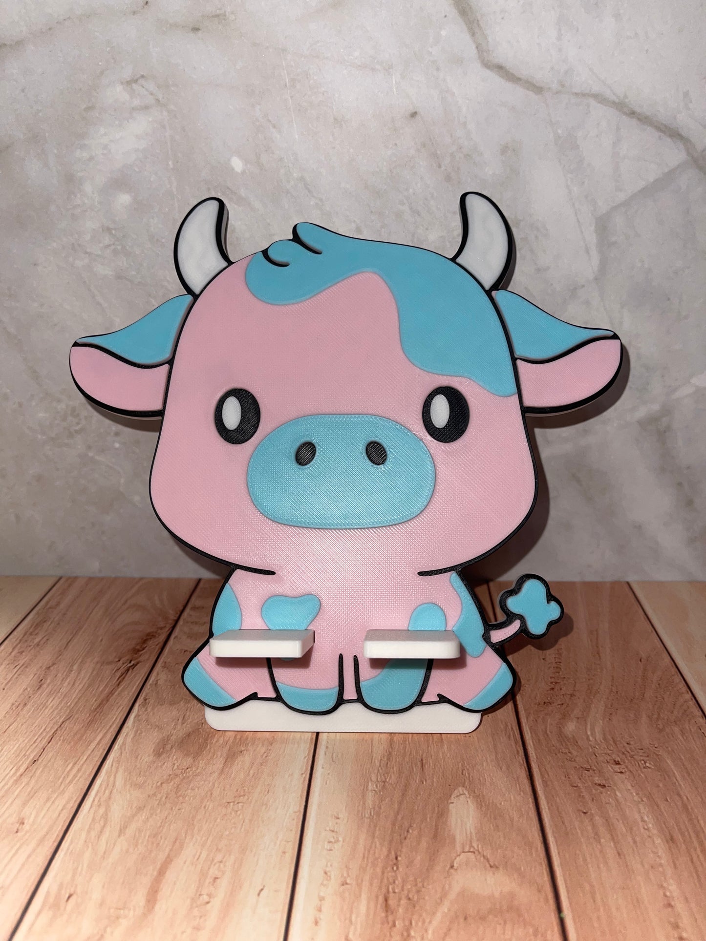 Cow phone stand